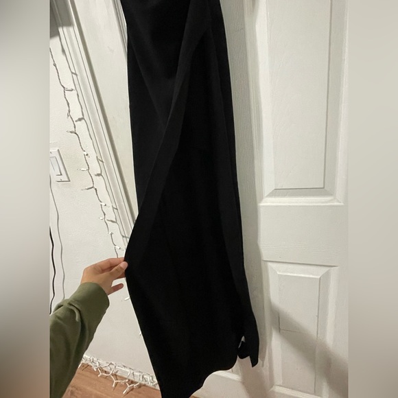 Just a plain black dress with a open leg slit. - Picture 4 of 4